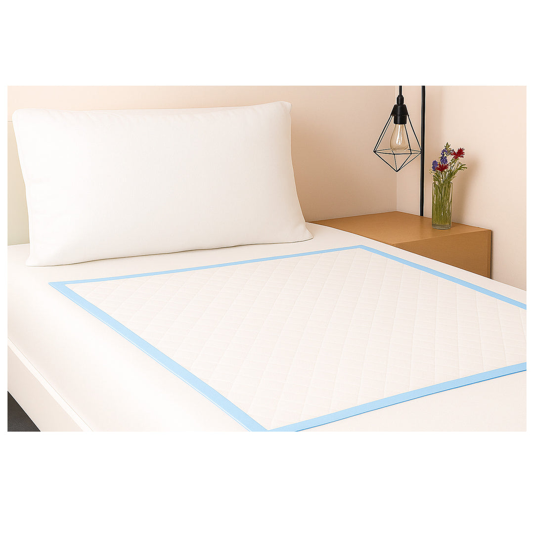 Bed with SPC Disposable Underpads with Adhesive Bed Pads on a light background